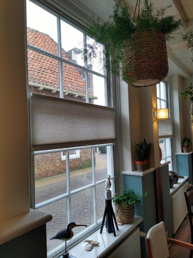 Bed & Brasserie Het Kosthuys Sint-Maartensdijk Esterno foto