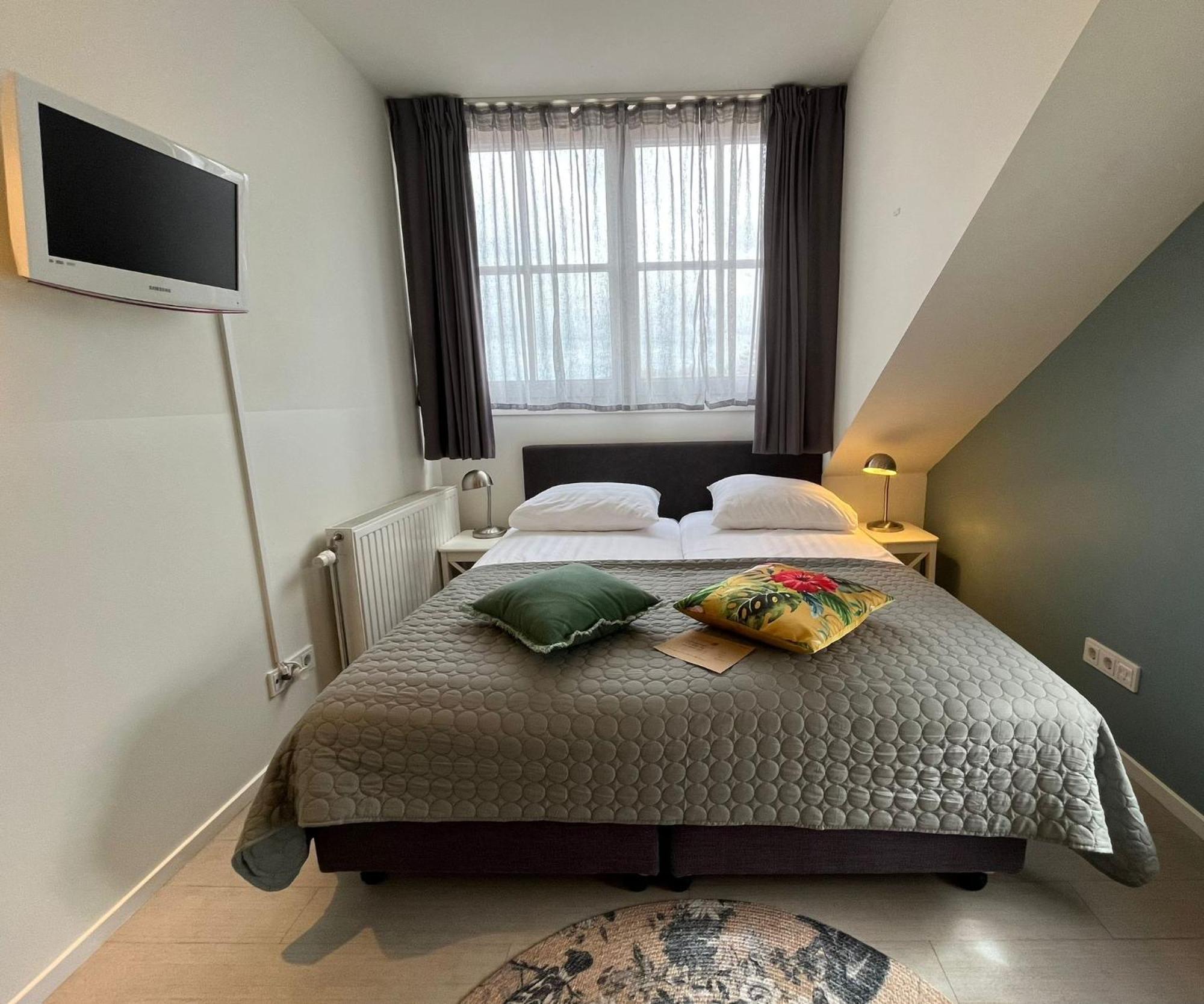 Bed & Brasserie Het Kosthuys Sint-Maartensdijk Esterno foto